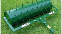 Spiked roller for lawns
